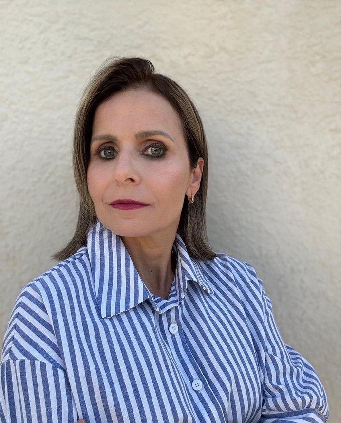 Retrato profissional da Dra. Roberta Siqueira, inscrita na OAB Goiás.